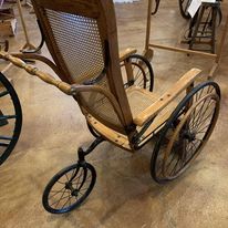 1880s Three-wheeled Wooden Wheelchair with Cane Seat and Back