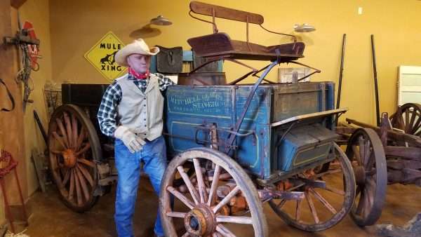 The fully conserved Mitchell Wagon in its new home at the Northwest Carriage Museum.