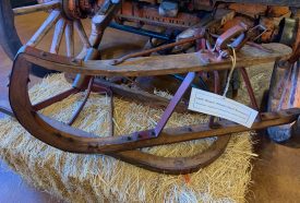 1880s wooden and metal sleigh runners for converting a wheeled buggy into a sleigh.